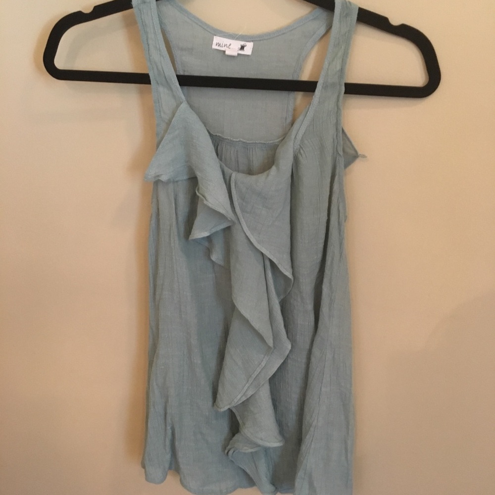 Light green ruffled blouse